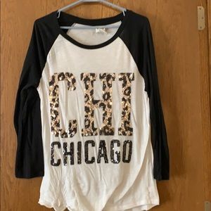 Pink shirt with sequins chicago on front